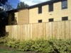 Large custom fence to enclose chiller unit (A/C). Fence is 8� tall and 6� thick.