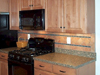 Tile backsplash installed � Kitchen complete.
